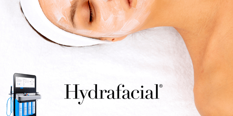Professional esthetician performing a facial treatment at Bella Noor Skincare.